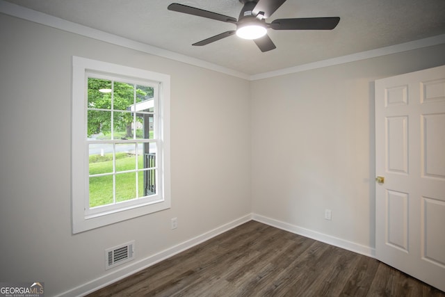 235 Cindy St, Jackson, GA 30233 - spare room with dark wood-style floors, a ceiling fan, and ornamental molding