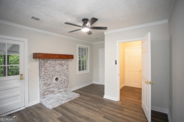 235 Cindy St, Jackson, GA 30233 - unfurnished living room with dark wood-style floors, a textured ceiling, healthy amount of natural light, ceiling fan, and crown molding
