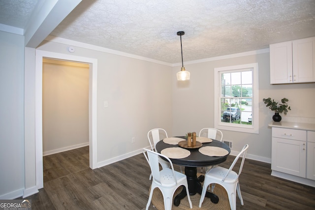 235 Cindy St, Jackson, GA 30233 - dining area featuring a textured ceiling and dark wood finished floors