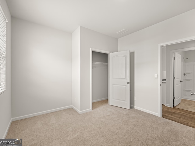 410 Oak View Ln, Dallas, GA 30157 - unfurnished bedroom with carpet floors, multiple windows, and a closet