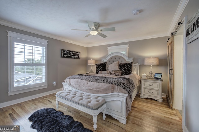198 Hillcrest Dr, Calhoun, GA 30701 - bedroom featuring a barn door, crown molding, light wood finished floors, and ceiling fan