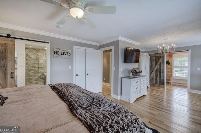 198 Hillcrest Dr, Calhoun, GA 30701 - bedroom featuring a chandelier, light wood-style floors, ornamental molding, ensuite bath, and a barn door
