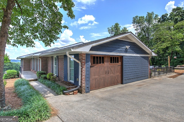 198 Hillcrest Dr, Calhoun, GA 30701 - view of front facade with brick siding, a garage, and driveway