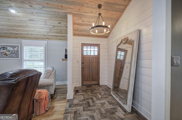 198 Hillcrest Dr, Calhoun, GA 30701 - foyer entrance with lofted ceiling, wood ceiling, a chandelier, plenty of natural light, and wood walls