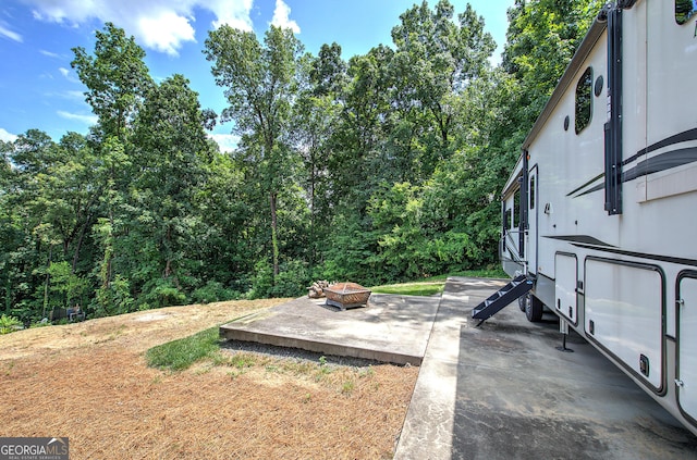 198 Hillcrest Dr, Calhoun, GA 30701 - view of yard featuring an outdoor fire pit and a patio area
