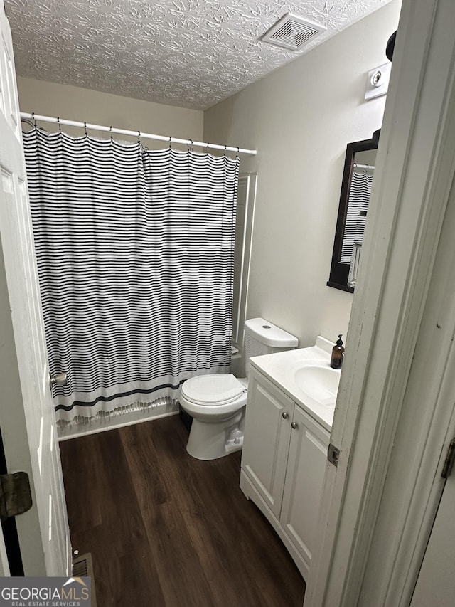 3332 Waldrop Trl, Decatur, GA 30034 - bathroom featuring vanity, wood finished floors, and a shower with shower curtain
