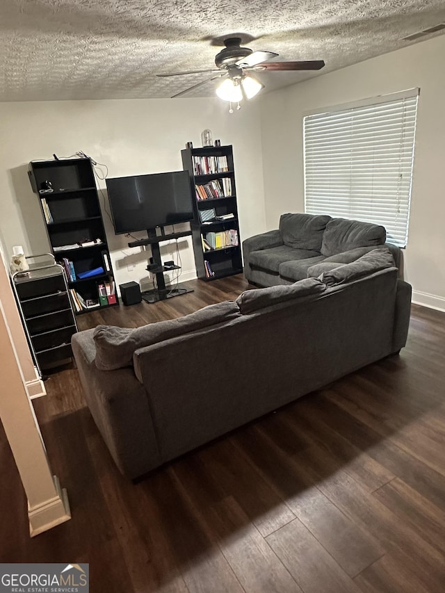 3332 Waldrop Trl, Decatur, GA 30034 - living area with wood finished floors, a ceiling fan, and a textured ceiling