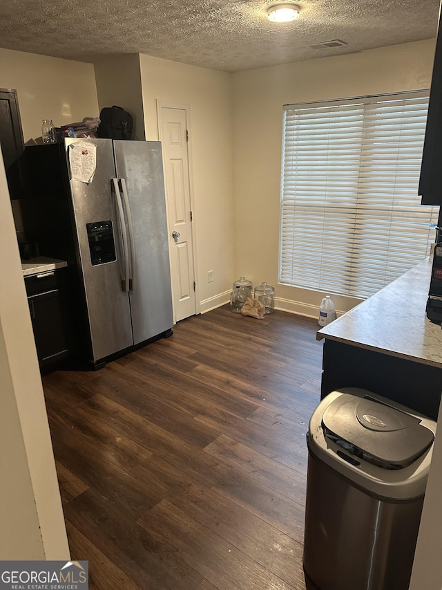 3332 Waldrop Trl, Decatur, GA 30034 - kitchen featuring stainless steel fridge with ice dispenser, a textured ceiling, and dark wood-type flooring
