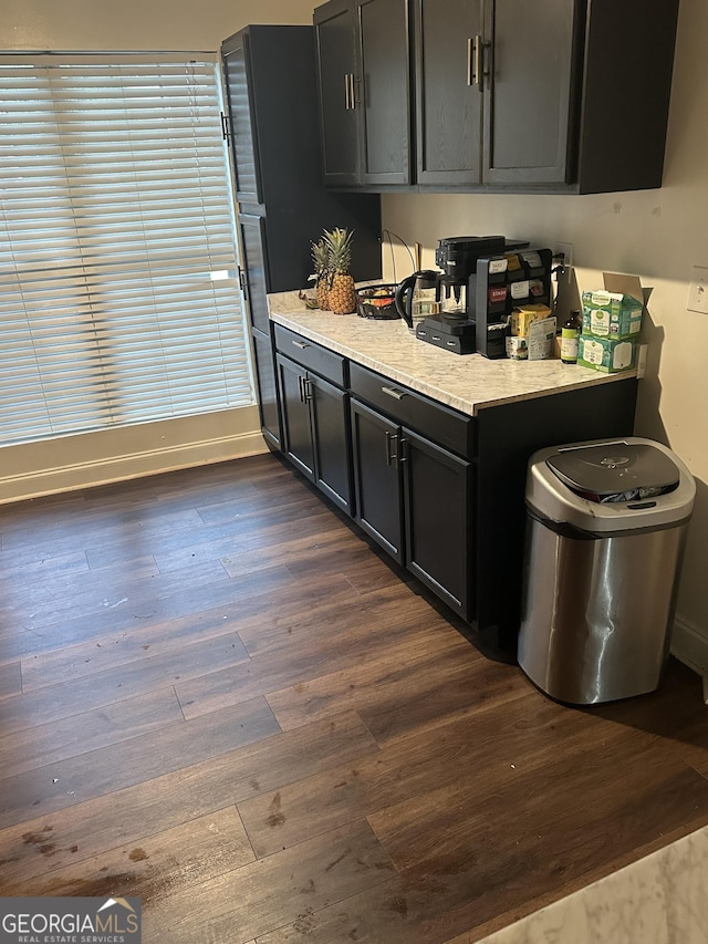 3332 Waldrop Trl, Decatur, GA 30034 - kitchen with dark wood-type flooring, light countertops, and dark cabinetry
