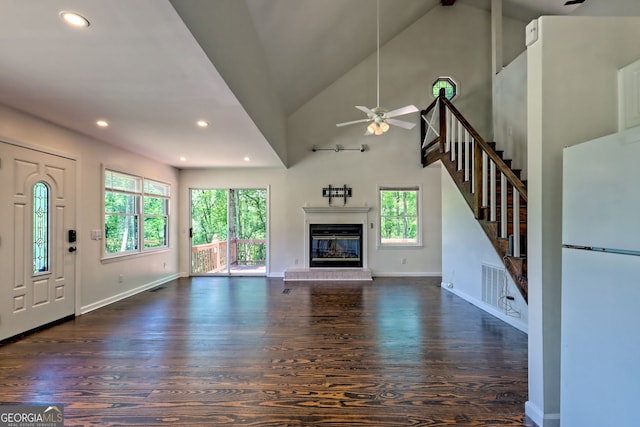 967 Saddle Gap Dr, Clayton, GA 30525 - unfurnished living room featuring ceiling fan, recessed lighting, wood finished floors, plenty of natural light, and high vaulted ceiling
