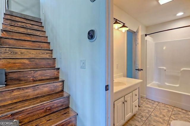 967 Saddle Gap Dr, Clayton, GA 30525 - full bath featuring vanity, tile patterned floors, washtub / shower combination, and recessed lighting