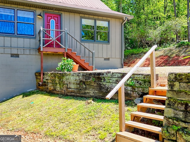 967 Saddle Gap Dr, Clayton, GA 30525 - doorway to property featuring crawl space, a metal roof, and a yard