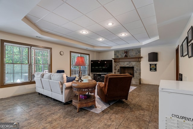 1770 Whippoorwill Rd, Watkinsville, GA 30677 - living room featuring a raised ceiling and a fireplace
