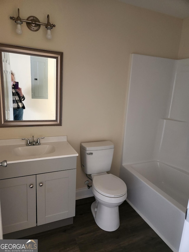 118 Ronald Pride Blvd, Fort Valley, GA 31030 - full bath with electric panel, vanity, wood finished floors, and  shower combination