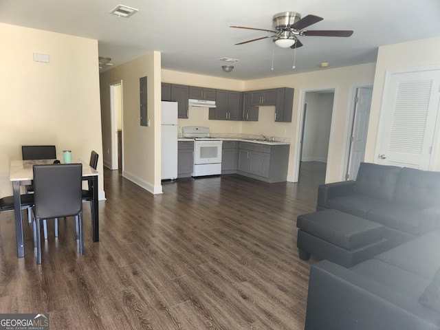 118 Ronald Pride Blvd, Fort Valley, GA 31030 - living area featuring a ceiling fan, dark wood finished floors, and electric panel