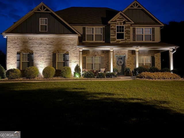 173 Lavender Way, Mcdonough, GA 30252 - craftsman inspired home featuring board and batten siding, a front yard, and stone siding