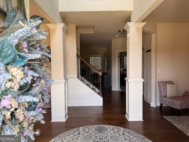 173 Lavender Way, Mcdonough, GA 30252 - entrance foyer with decorative columns, hardwood / wood-style flooring, wainscoting, stairway, and a decorative wall