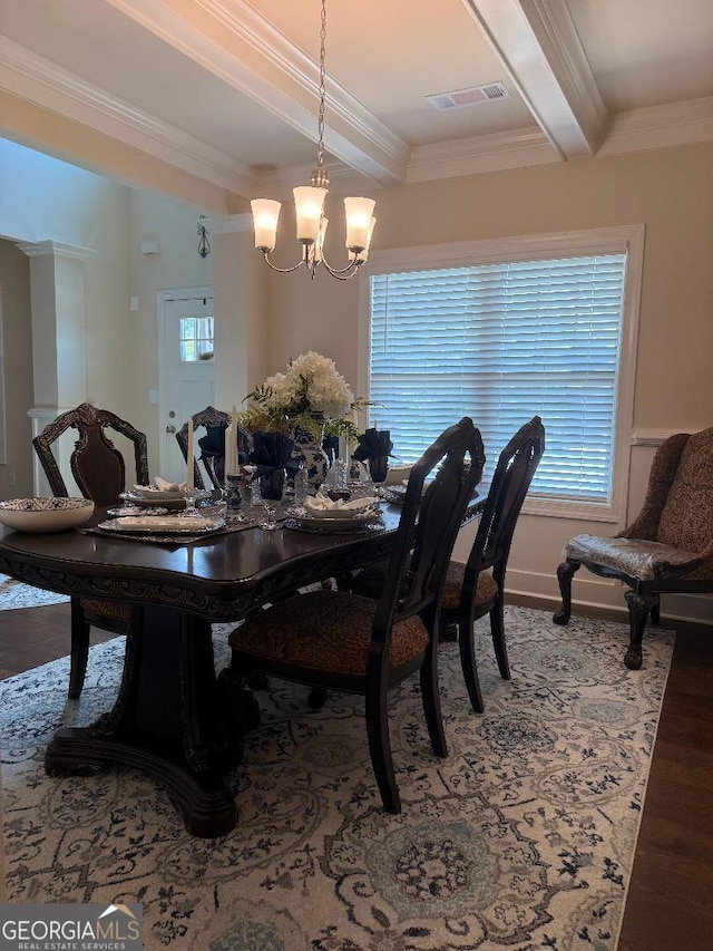 173 Lavender Way, Mcdonough, GA 30252 - dining space with a chandelier, ornamental molding, beam ceiling, and wood finished floors