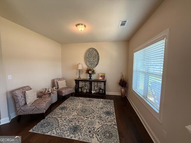 173 Lavender Way, Mcdonough, GA 30252 - sitting room featuring baseboards and dark wood-style floors