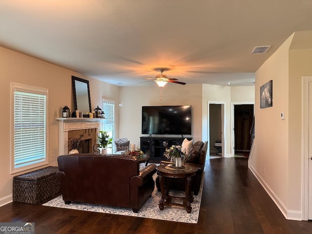 173 Lavender Way, Mcdonough, GA 30252 - living area with ceiling fan, wood-type flooring, and a brick fireplace