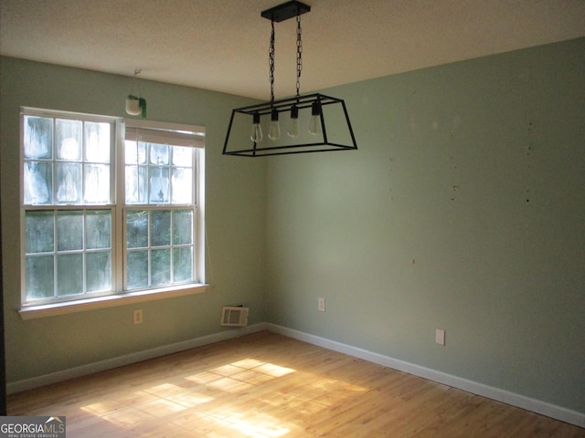 181 Thorpe Rd, Jackson, GA 30233 - unfurnished dining area with light wood-style flooring and baseboards