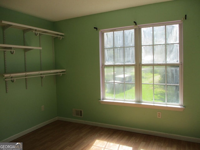 181 Thorpe Rd, Jackson, GA 30233 - unfurnished room with wood finished floors and plenty of natural light