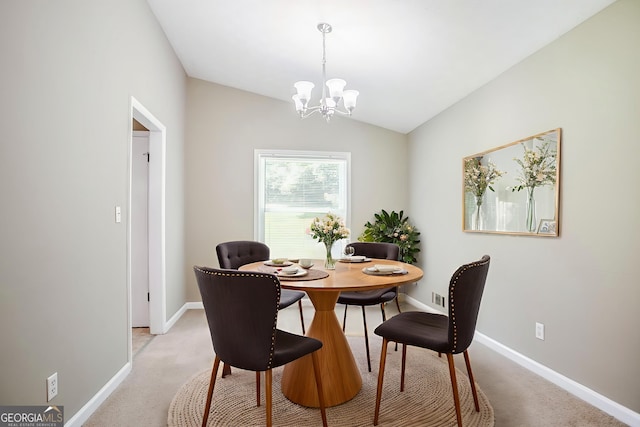 717 Raven Springs Trl, Stone Mountain, GA 30087 - dining room featuring light carpet, a chandelier, and lofted ceiling