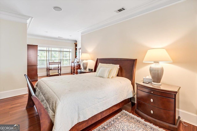 311 N Rivoli Farms Dr, Macon, GA 31210 - bedroom with wood finished floors and ornamental molding