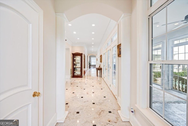 311 N Rivoli Farms Dr, Macon, GA 31210 - hallway featuring arched walkways, recessed lighting, and crown molding