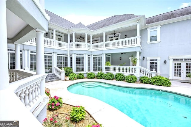 311 N Rivoli Farms Dr, Macon, GA 31210 - swimming pool with a ceiling fan, french doors, and a patio