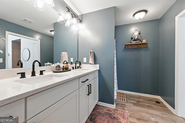 4829 Caboose Ln NW, Acworth, GA 30102 - full bath featuring double vanity and wood finished floors