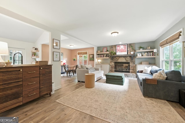 4829 Caboose Ln NW, Acworth, GA 30102 - living room with wood finished floors and a stone fireplace