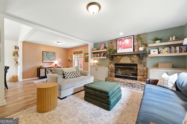 4829 Caboose Ln NW, Acworth, GA 30102 - living area featuring a stone fireplace and wood finished floors