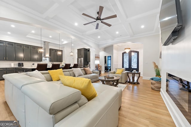 896 Bobby Jones Dr, Dublin, GA 31021 - living room with decorative columns, recessed lighting, light wood finished floors, arched walkways, and ceiling fan