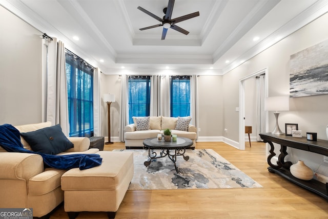 896 Bobby Jones Dr, Dublin, GA 31021 - living room with a raised ceiling, ceiling fan, wood finished floors, crown molding, and recessed lighting