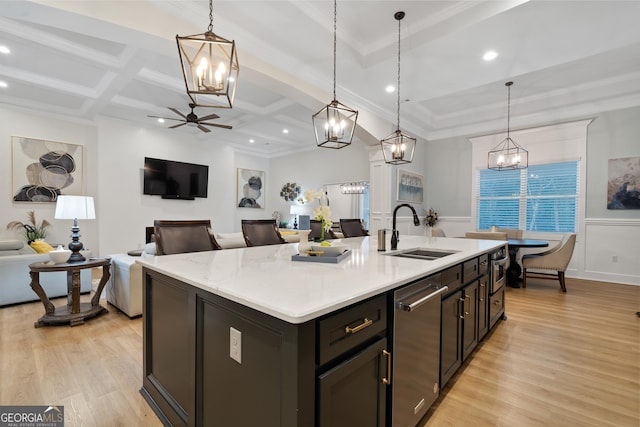 896 Bobby Jones Dr, Dublin, GA 31021 - kitchen with a chandelier, ceiling fan, light countertops, light wood-type flooring, and coffered ceiling