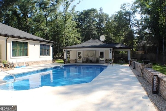 896 Bobby Jones Dr, Dublin, GA 31021 - view of swimming pool with a patio, a storage structure, an outbuilding, and an outdoor hangout area