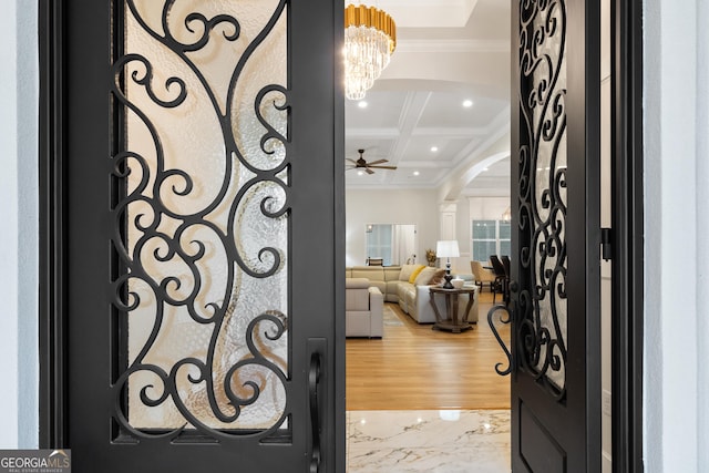 896 Bobby Jones Dr, Dublin, GA 31021 - foyer with arched walkways, coffered ceiling, crown molding, a ceiling fan, and beam ceiling