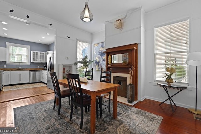 303 W 39th St, Savannah, GA 31405 - dining room with crown molding, light wood-style floors, and recessed lighting