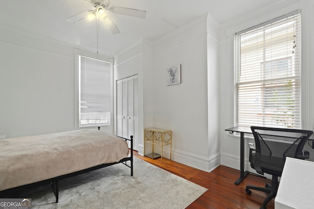 303 W 39th St, Savannah, GA 31405 - bedroom with ornamental molding, wood finished floors, an office area, a closet, and ceiling fan