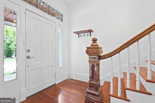 303 W 39th St, Savannah, GA 31405 - foyer with hardwood / wood-style flooring and stairs