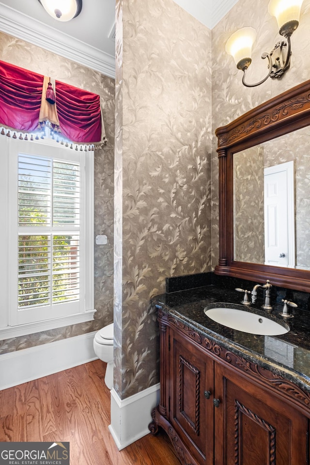 1005 Lyndhurst Way SE, Conyers, GA 30013 - half bath with wood finished floors, vanity, and crown molding