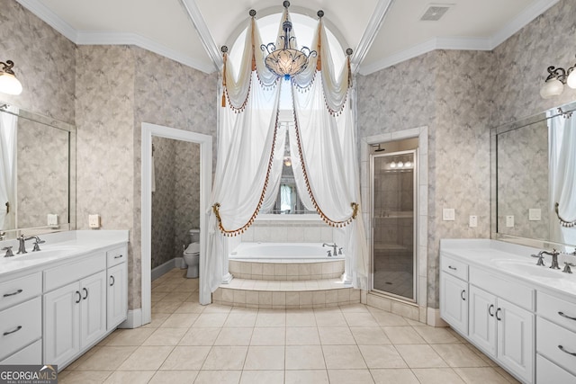 1005 Lyndhurst Way SE, Conyers, GA 30013 - bathroom with crown molding, two vanities, a bath, a shower stall, and tile patterned floors