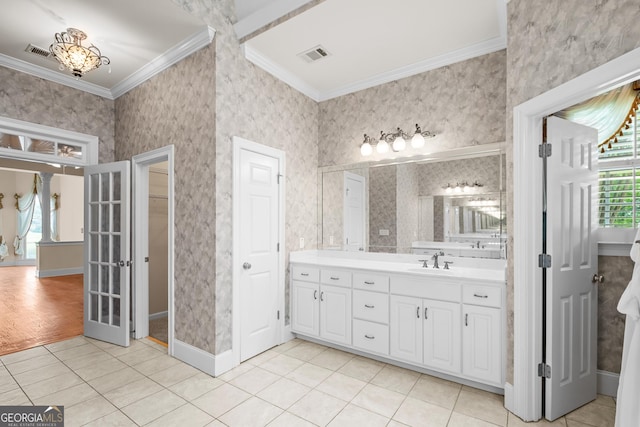 1005 Lyndhurst Way SE, Conyers, GA 30013 - full bath with crown molding, healthy amount of natural light, vanity, tile patterned flooring, and wallpapered walls