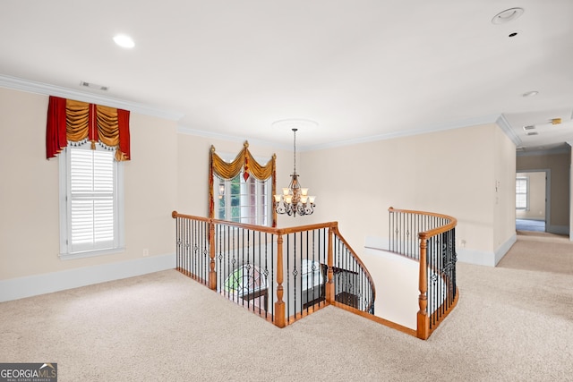 1005 Lyndhurst Way SE, Conyers, GA 30013 - hall featuring an upstairs landing, ornamental molding, a chandelier, carpet flooring, and recessed lighting