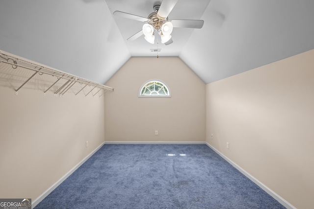 1005 Lyndhurst Way SE, Conyers, GA 30013 - walk in closet featuring ceiling fan, carpet, and lofted ceiling