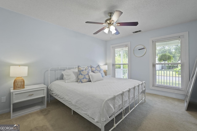 126 S Sheftall Cir, Savannah, GA 31410 - bedroom with carpet flooring, a textured ceiling, and ceiling fan