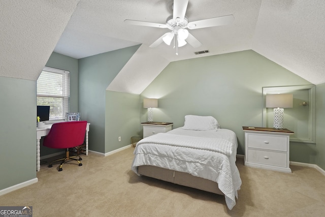 126 S Sheftall Cir, Savannah, GA 31410 - carpeted bedroom with a textured ceiling, lofted ceiling, a desk, and a ceiling fan