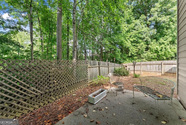4015 Snowshoe Ct NW, Acworth, GA 30101 - fenced backyard featuring a patio area