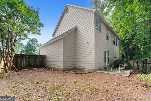 4015 Snowshoe Ct NW, Acworth, GA 30101 - view of property exterior featuring a patio area and a fenced backyard